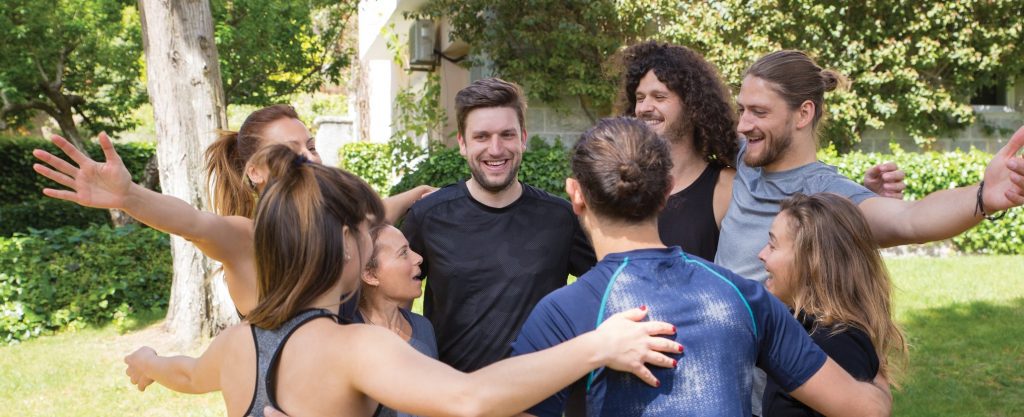 Group hug outdoors Group hug outdoors