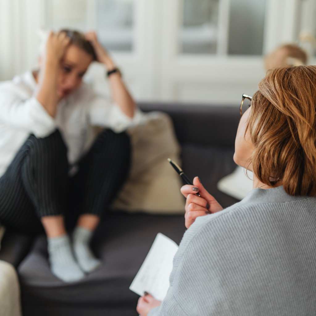 Person talking with a counselor during a private session