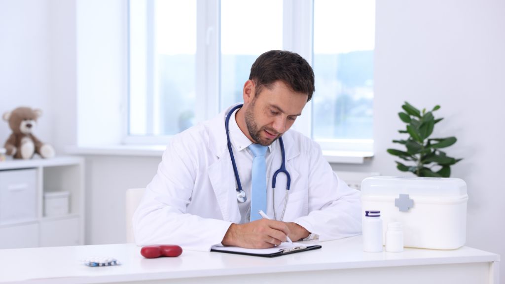 Physician reviewing patient information for medically supervised treatment