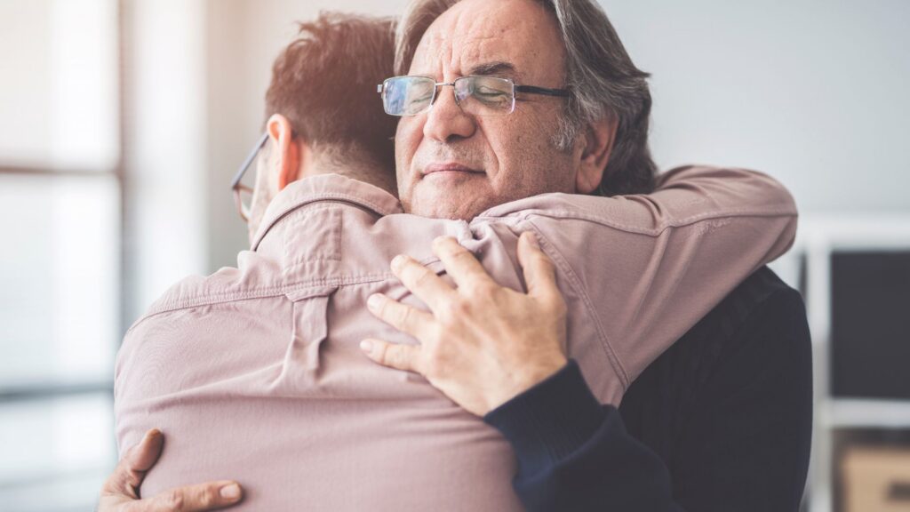 Family members embracing during a difficult moment
